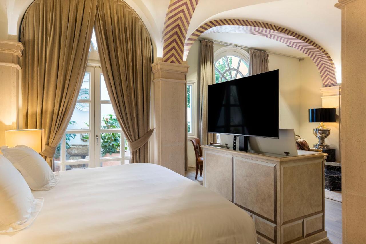 Casa De Triana Luxury Suites By Casa Del Poeta Севилья Экстерьер фото